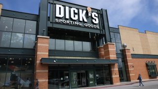 A sign is posted in front of a Dick’s Sporting Goods store on September 04, 2024 in Daly City, California.