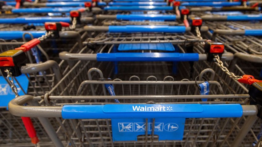 Shopping carts are lined up inside a Walmart store in Hamilton, Ontario, Canada, January 28, 2025. 