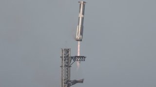 The Super Heavy booster returns to its launch pad after the SpaceX Starship continued to space after it was launched on its eighth test at the company’s Boca Chica launch pad in Brownsville, Texas, U.S., March 6, 2025.
