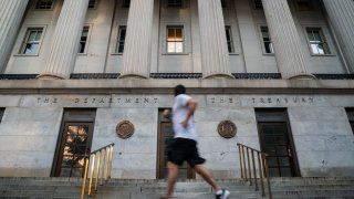 Moody's Ratings slashed the United States' credit rating down a notch on Friday.
