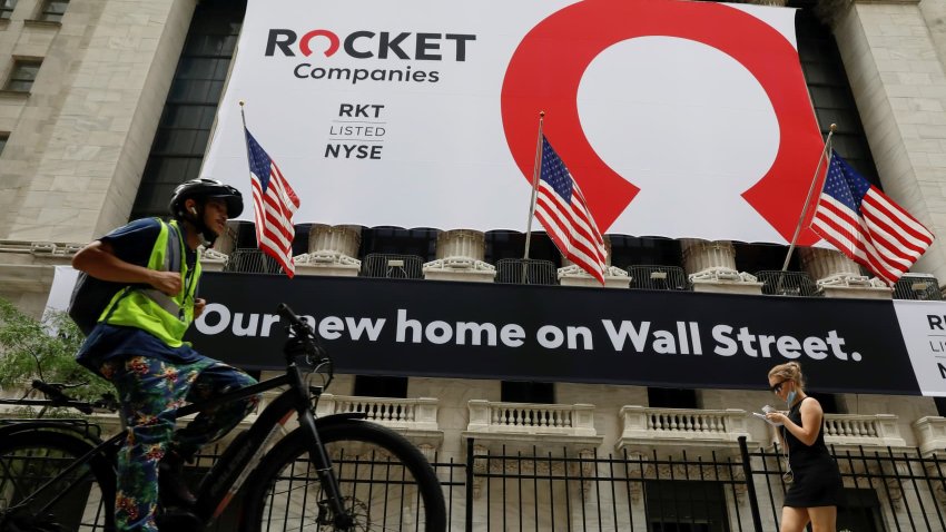FILE PHOTO: A banner celebrating Rocket Companies Inc., the parent company of U.S. mortgage lender Quicken Loans, IPO is seen on the front facade of the New York Stock Exchange in New York City, U.S., August 6, 2020.