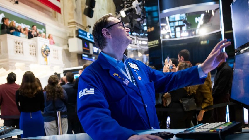 Traders work on the floor of the New York Stock Exchange on April 16, 2025.