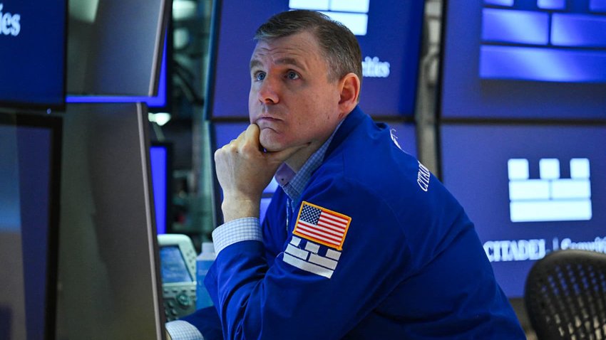 A trader works on the floor of the New York Stock Exchange (NYSE) in New York City.