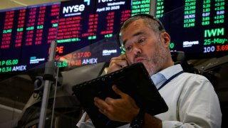 Futures-options traders work on the floor at the American Stock Exchange (AMEX) at the New York Stock Exchange (NYSE) in New York City, U.S., April 30, 2025.