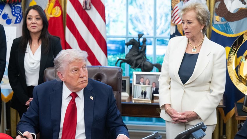 US President Donald Trump signs executive orders relating to higher education institutions, alongside US Secretary of Education Linda McMahon (R), in the Oval Office of the White House in Washington, DC, on April 23, 2025.
