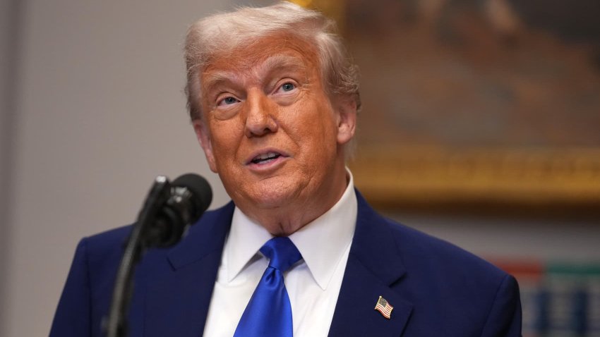 President Donald Trump, joined by National Institutes of Health (NIH) Director Jay Bhattacharya,  speaks during a press conference in the Roosevelt Room of the White House on May 12, 2025, in Washington, DC.