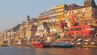 This photo was shot from Varanasi, India in the morning. The soft sun light touch the old building along the ganga river. “n”nVaranasi is a North Indian city on the banks of the Ganges in Uttar Pradesh. It is one of the oldest continuously inhabited cities in the world. The spiritual capital of India, it is the holiest of the seven sacred cities in Hinduism and Jainism, and played an important role in the development of Buddhism.