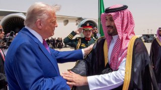 U.S. President Donald Trump shakes hands with Saudi Crown Prince Mohammed Bin Salman during a welcoming ceremony in Riyadh, Saudi Arabia, May 13, 2025.