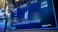 UnitedHealth Group Inc. signage on the floor of the New York Stock Exchange (NYSE) in New York, US, on Monday, April 21, 2025.
