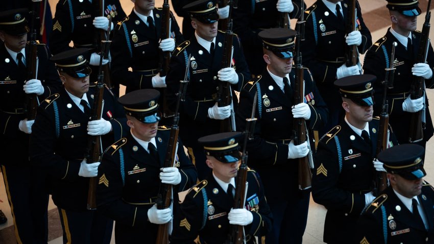 Members of the military stand as US President Donald Trump reviews the troops in Emancipation Hall during inauguration ceremonies at the US Capitol in Washington, on January 20, 2025.