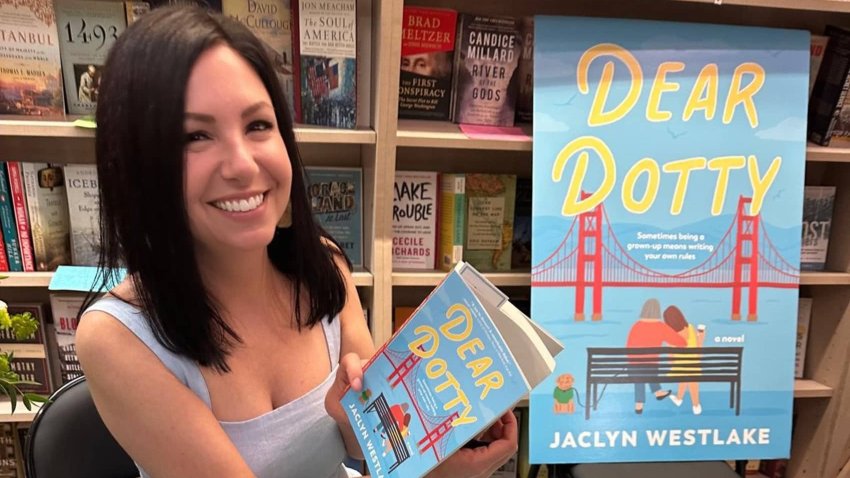 Jaclyn Westlake poses at a book signing for her first novel, “Dear Dotty.”