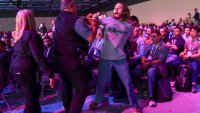 A demonstrator is removed from the audience as they interrupt a presentation by Microsoft Chairman and CEO Satya Nadella at the Microsoft Build 2025 conference in Seattle, Washington on May 19, 2025.