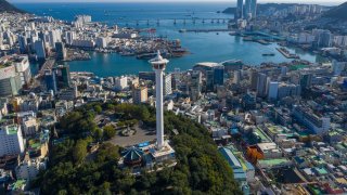 Overlooking the city with Busan Tower in Yongdusan Park. Nampo-dong, Busan, South Korea.