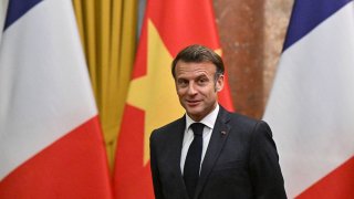 TOPSHOT – France’s President Emmanuel Macron reacts during a meeting with Vietnam’s President Luong Cuong sat the Presidential Palace in Hanoi on May 26, 2025. (Photo by Nhac NGUYEN / POOL / AFP) (Photo by NHAC NGUYEN/POOL/AFP via Getty Images)