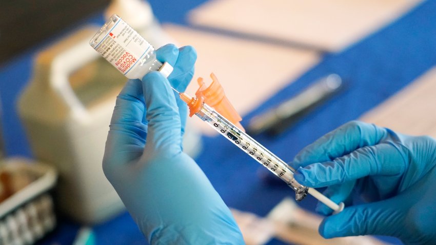 FILE – A nurse prepares a syringe of a COVID-19 vaccine at an inoculation station in Jackson, Miss., July 19, 2022. U.S. health officials are proposing a simplified approach to COVID-19 vaccinations, which would allow most adults and children to get a once-a-year shot to protect against the mutating virus. The new system unveiled Monday, Jan. 23, 2023 would make COVID-19 inoculations more like the annual flu shot. Americans would no longer have to keep track of how many shots they’ve received or how many months it’s been since their last booster.