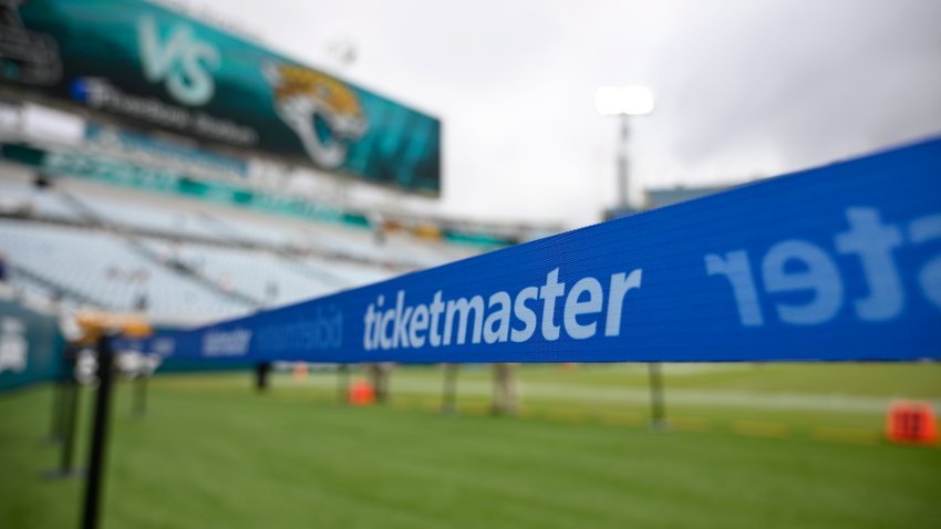 An advertisement for Ticketmaster is viewed along an area reserved for special guests on the sideline of the field before an NFL football game between the Jacksonville Jaguars and the Cleveland Browns, Sunday, Sept. 15, 2024, in Jacksonville, Fla.