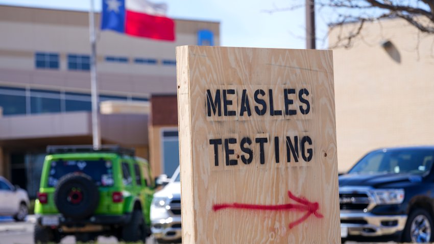 A sign offering measles testing