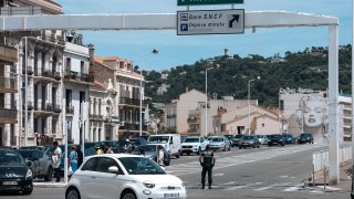 Police direct traffic during an electricity outage in Cannes, southern France, Saturday, May 24, 2025.