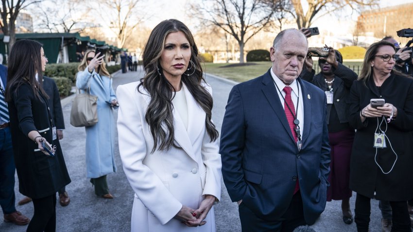 Kristi Noem and Tom Homan