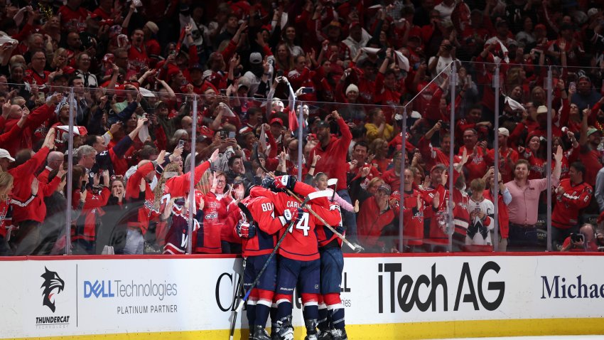 WASHINGTON, DC – APRIL 30: Brandon Duhaime #22 of the Washington Capitals celebrates with teammates after scoring an empty net goal against the Montreal Canadiens during the third period in Game Five of the First Round of the 2025 Stanley Cup Playoffs at Capital One Arena on April 30, 2025 in Washington, DC. (Photo by Scott Taetsch/Getty Images)
