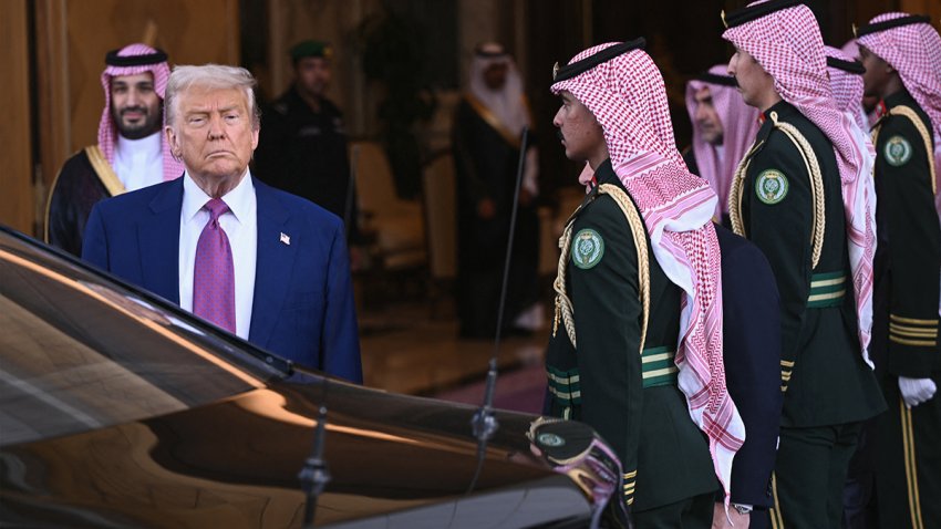 Crown Prince Mohammed bin Salman (L) looks on as President Donald Trump departs after a bilateral meeting in Riyadh on May 13, 2025.