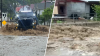 Boy swept away and school evacuated in floods as fallen trees block DC-area roads