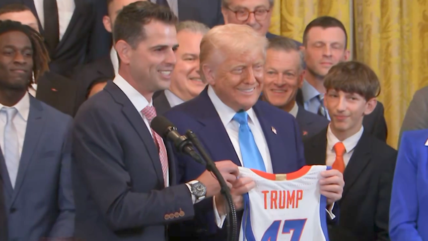 TRUMP HOLDS UP 47 JERSEY