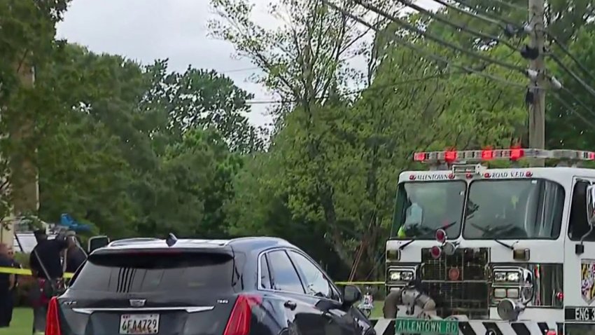 Two people are dead after coming into contact with a power line while working on a roof in Camp Springs, Maryland, on Tuesday morning.