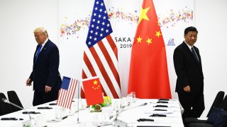 Chinese President Xi Jinping (R) and US President Donald Trump attend their bilateral meeting on the sidelines of the G20 Summit in Osaka on June 29, 2019.