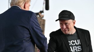 Tesla CEO Elon Musk, right, joins former U.S. president and Republican presidential candidate Donald Trump during a campaign rally at the site of the first assassination attempt against Trump, in Butler, Pennsylvania, Oct. 5, 2024.