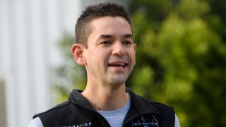 Inspiration4 mission commander Jared Isaacman, founder and chief executive officer of Shift4 Payments, stands for a portrait in front of the recovered first stage of a Falcon 9 rocket at Space Exploration Technologies Corp. (SpaceX) on February 2, 2021 in Hawthorne, California.