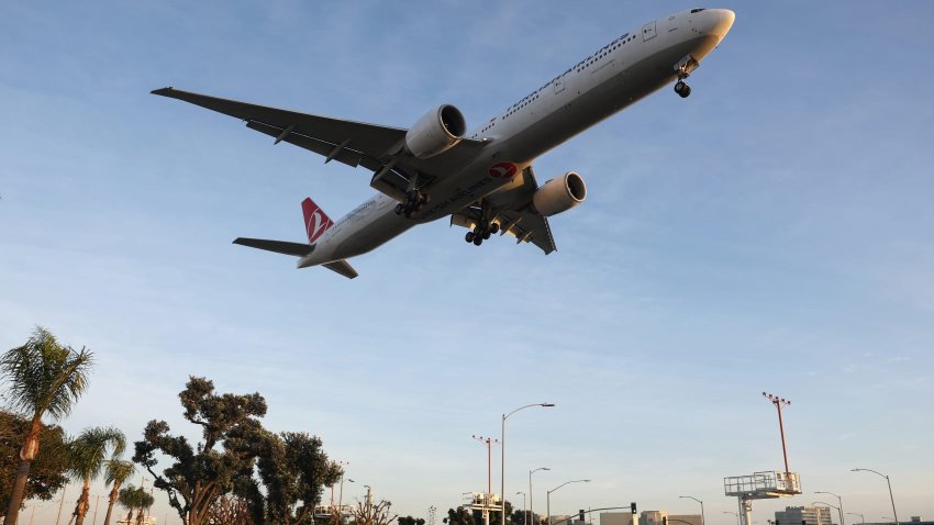 A Turkish Airlines plane landing from a park next to Los Angeles International Airport on Dec. 26, 2024.