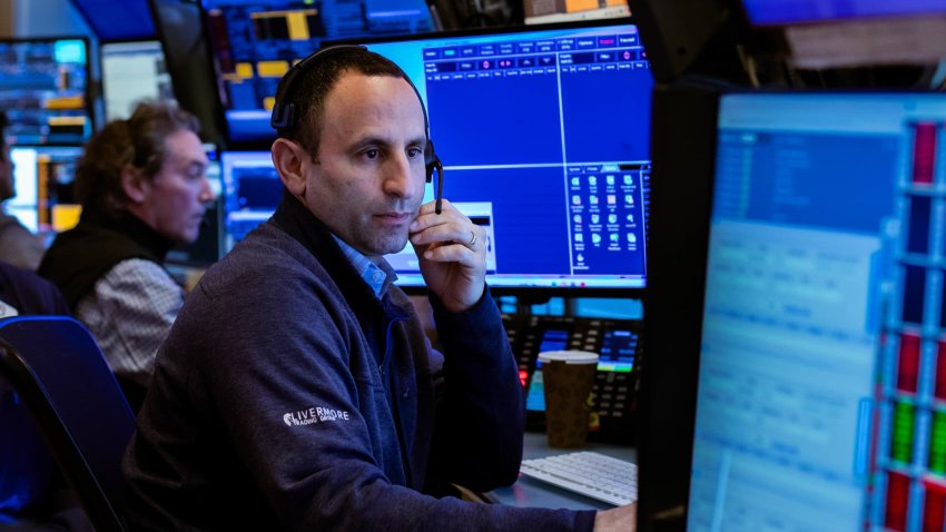 Traders work on the floor of the New York Stock Exchange on April 2, 2025. 