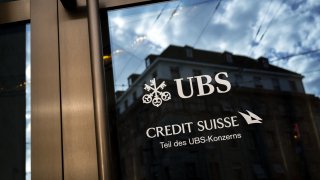 A sign in German that reads “part of the UBS group” in Basel on May 5, 2025.