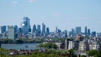 Skyline view of the City of London financial district from the viewpoint in Greenwich Park in London, United Kingdom.