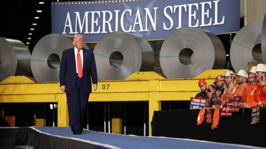 U.S. President Donald Trump walks as workers react at U.S. Steel Corporation–Irvin Works in West Mifflin, Pennsylvania, U.S., May 30, 2025.