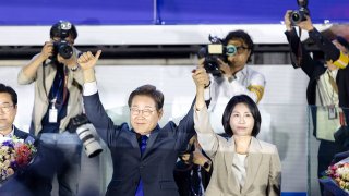 President-elect Lee Jae-myung arrives to attend a public vote count broadcast event hosted by the Democratic Party near the National Assembly in Yeouido, Seoul, South Korea, on June 4, 2025.