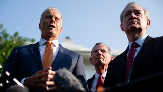 Senate Majority Leader John Thune, a Republican from South Dakota, from left, Senator John Barrasso, a Republican from Wyoming, and Senator Mike Crapo, a Republican from Idaho, speak to members of the media following a meeting outside the White House in Washington, DC, US, on Wednesday, June 4, 2025.