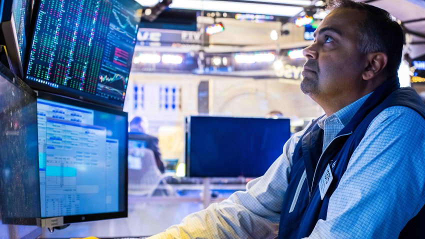 Traders work on the floor of the New York Stock Exchange on June 10, 2025.