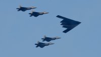 File: A B2 bomber leads a group of fighter jets during a military flyover as part of Independence Day festivities on July 4, 2020 as seen from Bayonne, New Jersey.