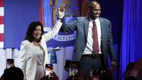 New York Gov. Kathy Hochul stands with Lieutenant governor Antonio Delgado during the primary election night party, Tuesday, June 28, 2022, in New York.