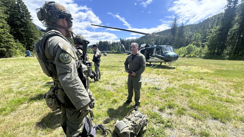In this handout photo provided by the Snohomish County Sheriff's Office deputies participate in the search for Travis Decker, at an undisclosed location in Washington state, Friday, June 6, 2025.