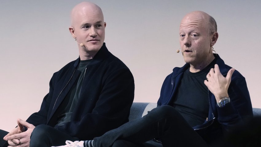 Brian Armstrong, left, Co-founder and CEO of Coinbase, and Jeremy Allaire, Co-Founder, Chairman and CEO of Circle, participate in the State of Crypto Summit, in New York, Thursday, June 12, 2025.