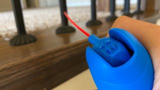 FILE - An air duster is used to clean.