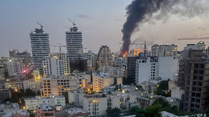 Smoke rises from the rubble of an Iranian state media building in Tehran after an Israeli airstrike on June 16, 2025. The strike, which Israel confirmed targeted “terror-linked propaganda infrastructure,” marks a further escalation in regional tensions.