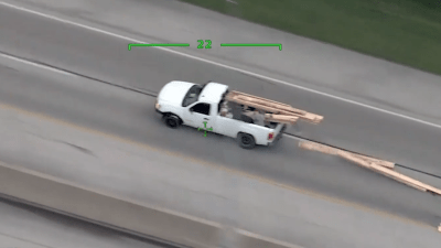 WATCH: Wild police chase ends in massive pileup after man throws boards at officers