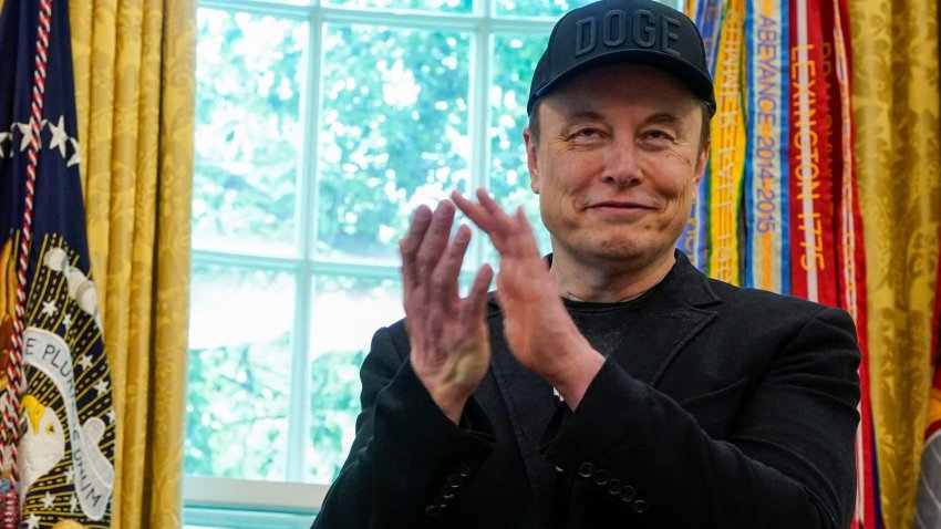 Elon Musk applaudes in the Oval Office as he attends a press conference with U.S. President Donald Trump, at the White House in Washington, D.C., U.S., May 30, 2025.