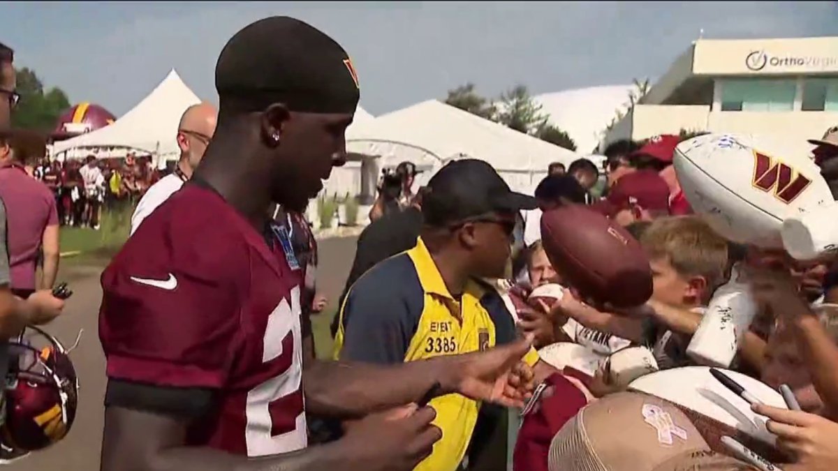 Washington Commanders players greet fans outside of training camp ...