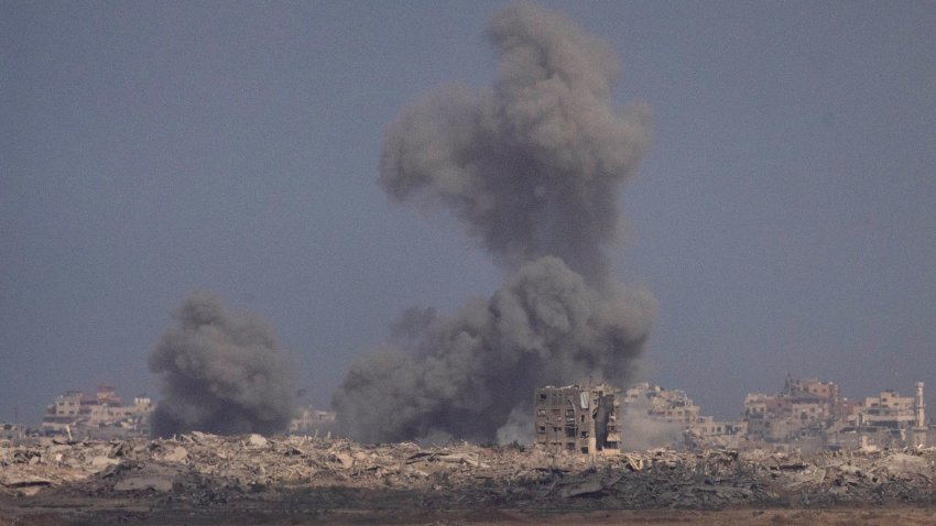 Smoke rises over the northern Gaza Strip after an Israeli bombardment as seen from a position on the Israeli side of the border on July 13, 2025 in Israel.