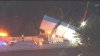 Tractor trailer dangles off Beltway bridge, forcing Maryland closures